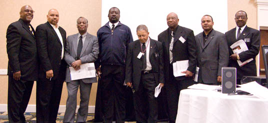 eight men standing