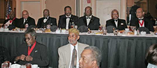men at head table