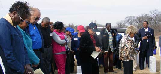 people at cemetery