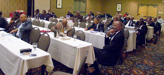 men seated at tables