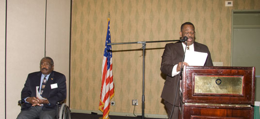 man at podium