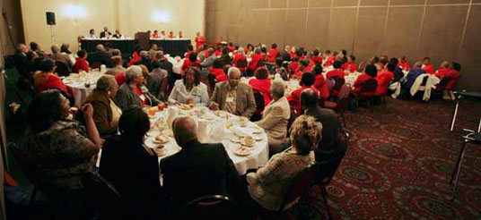 people sit at banquet tables