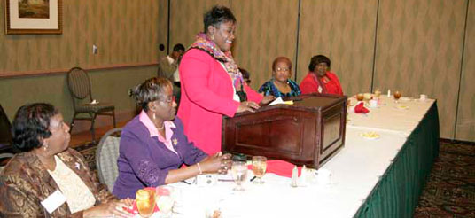 lady at head-table podium